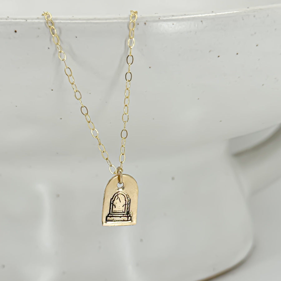 Buried Her Necklace