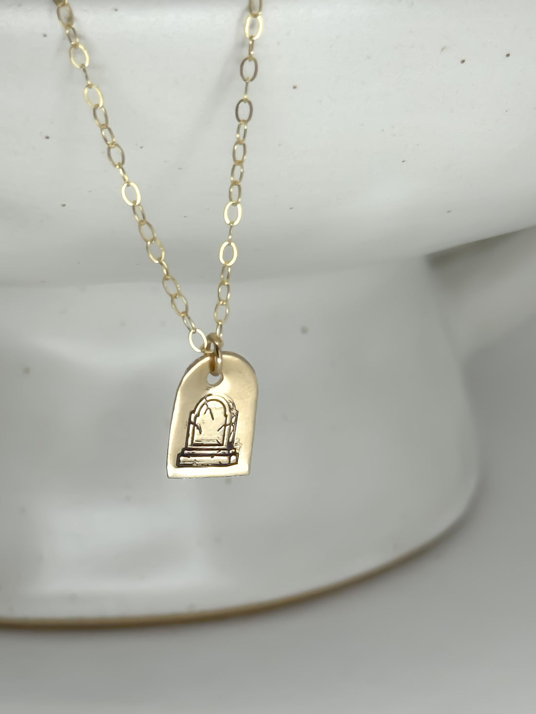 Buried Her Necklace