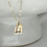 Buried Her Necklace